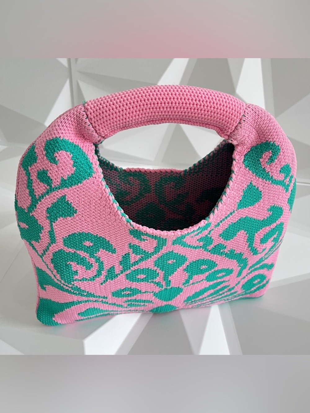 Pretty & Polished Pink and Green Knit Top Handle Clutch
Boho Style - Picture 4 of 11
